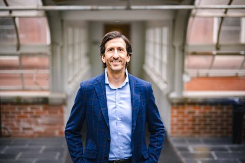 Diego Maggi stands in a greenhouse at Lehigh University